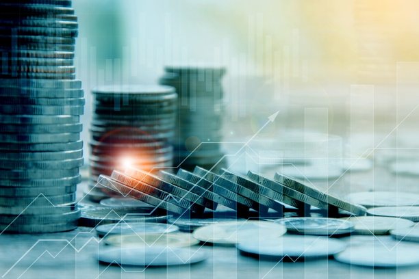 coins and graph increasing, representing stock markets rising indicating more money for the stock options.