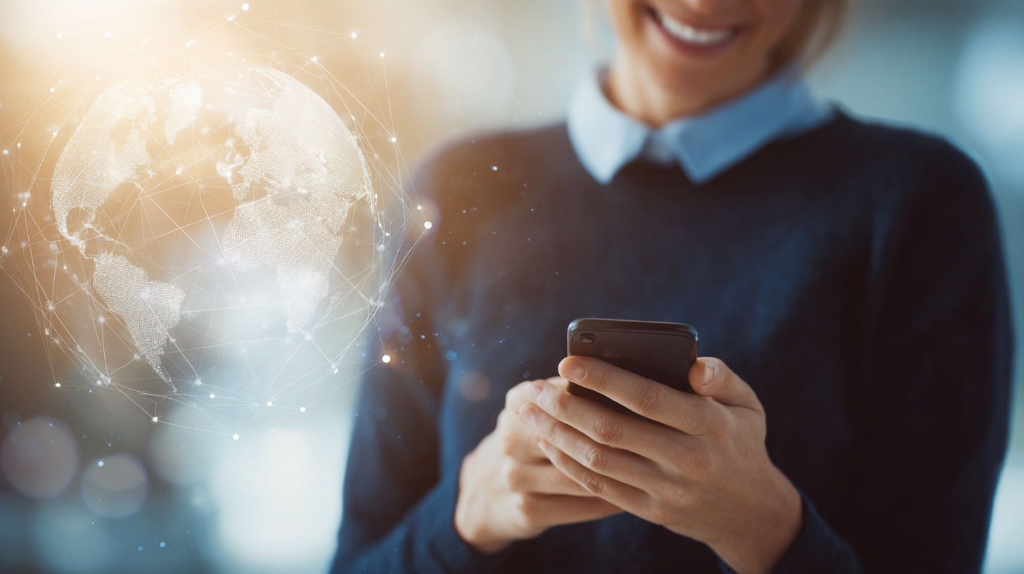 A young professional interacting with a smartphone, demonstrating the seamless user experience of our Innovative Digital Solutions