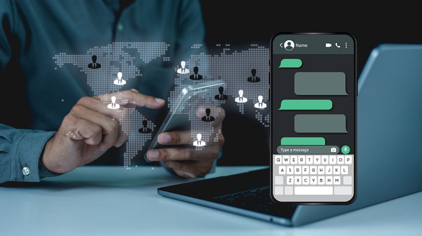 A WhatsApp Business UI showing a verified brand chat with interactive reply buttons, powered by our Canadian mobile messaging solutions.