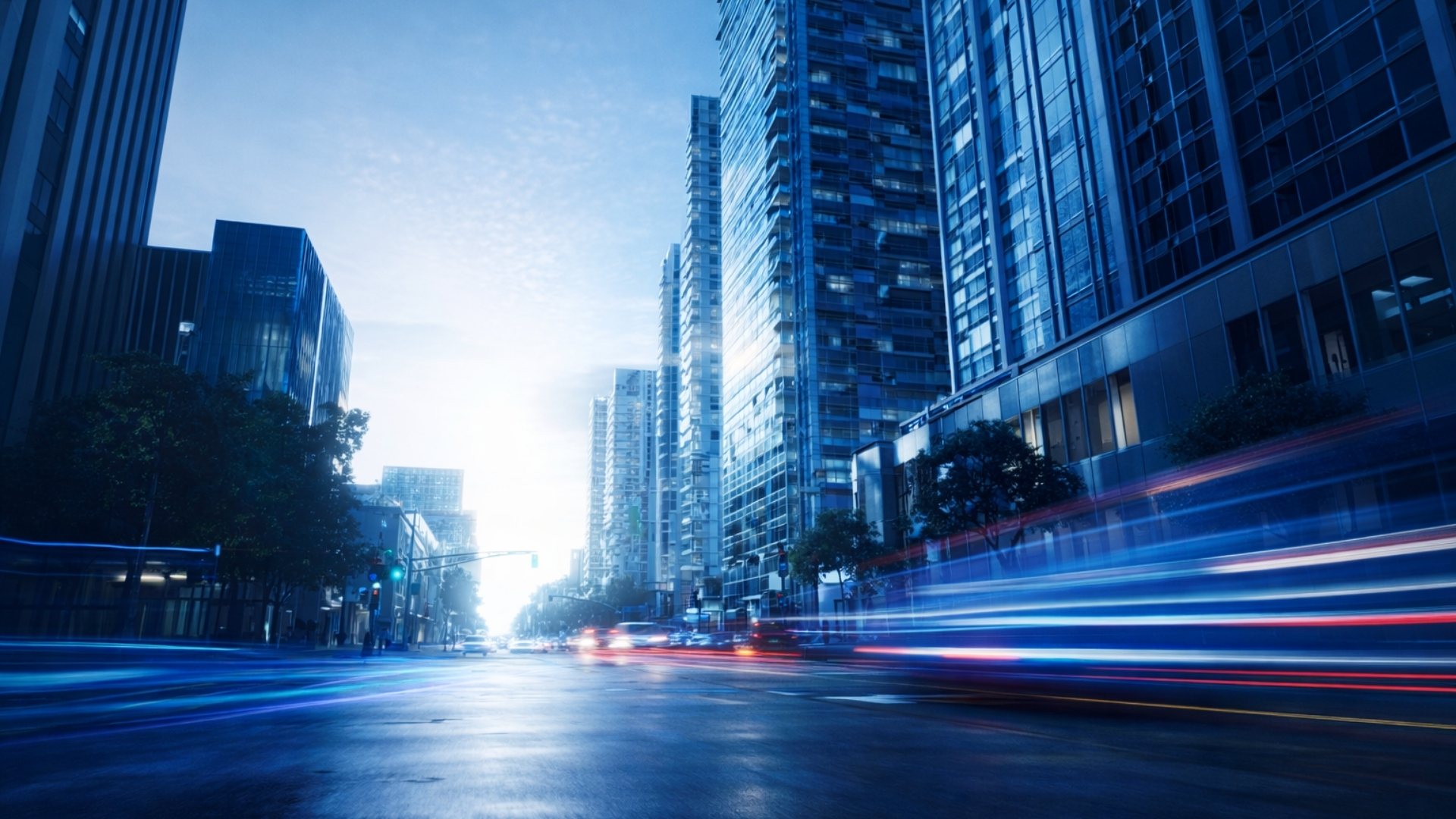 Cars blurred driving fast in city center