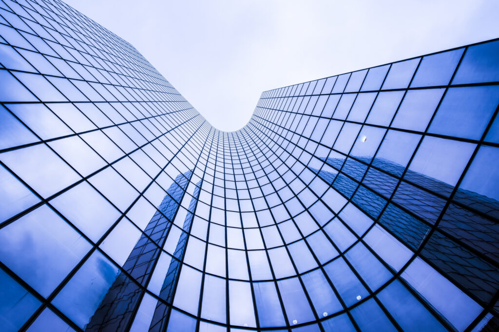 Corporate office building with IC Group blue hue